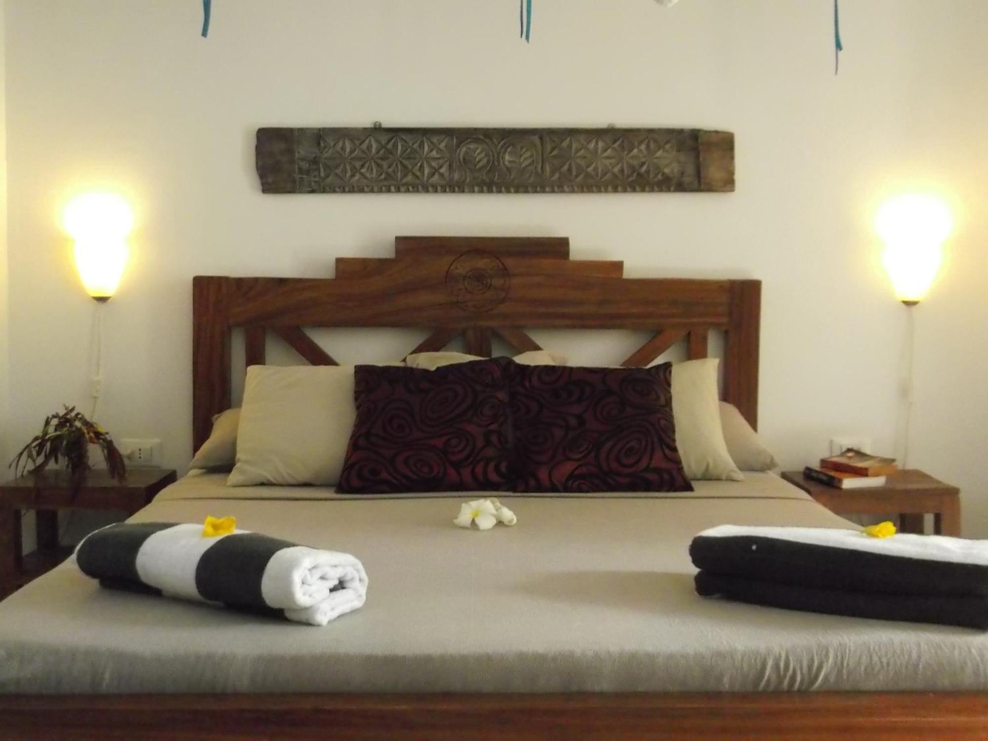 Kobe House Bed & Breakfast Джамбиани Стая снимка